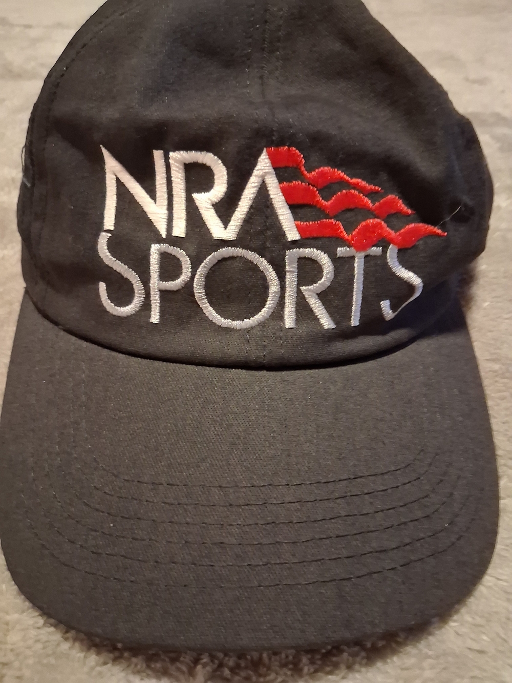 NRA Sports Black Baseball Cap with Red Accent Embroderied